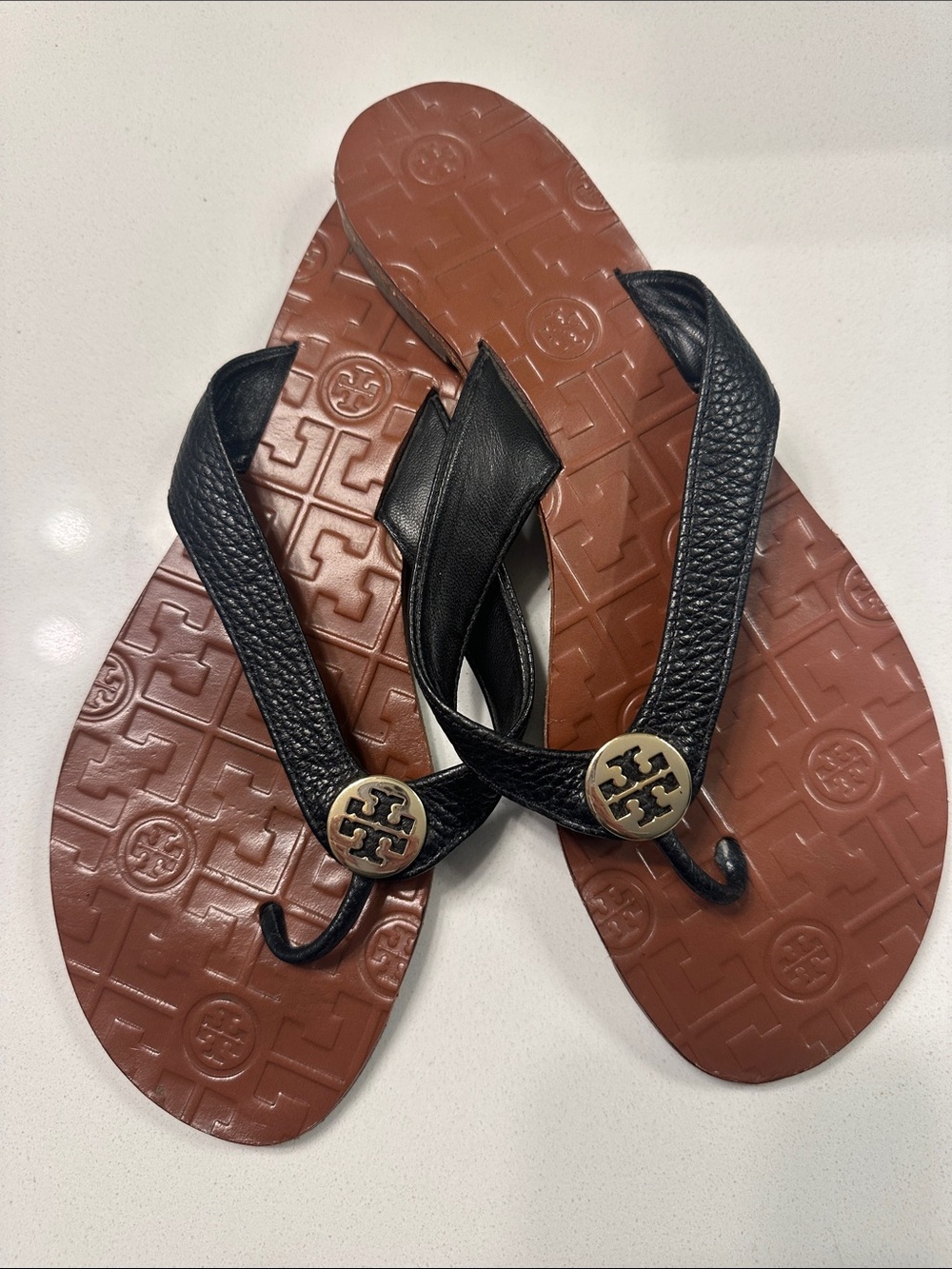 Tory Burch Black Leather Flip Flop Sandals with Gold Logo Medallions